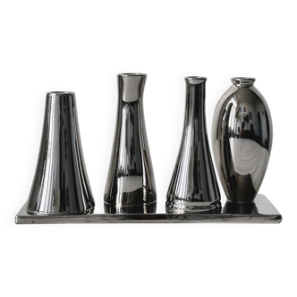 Silver soliflore vases.