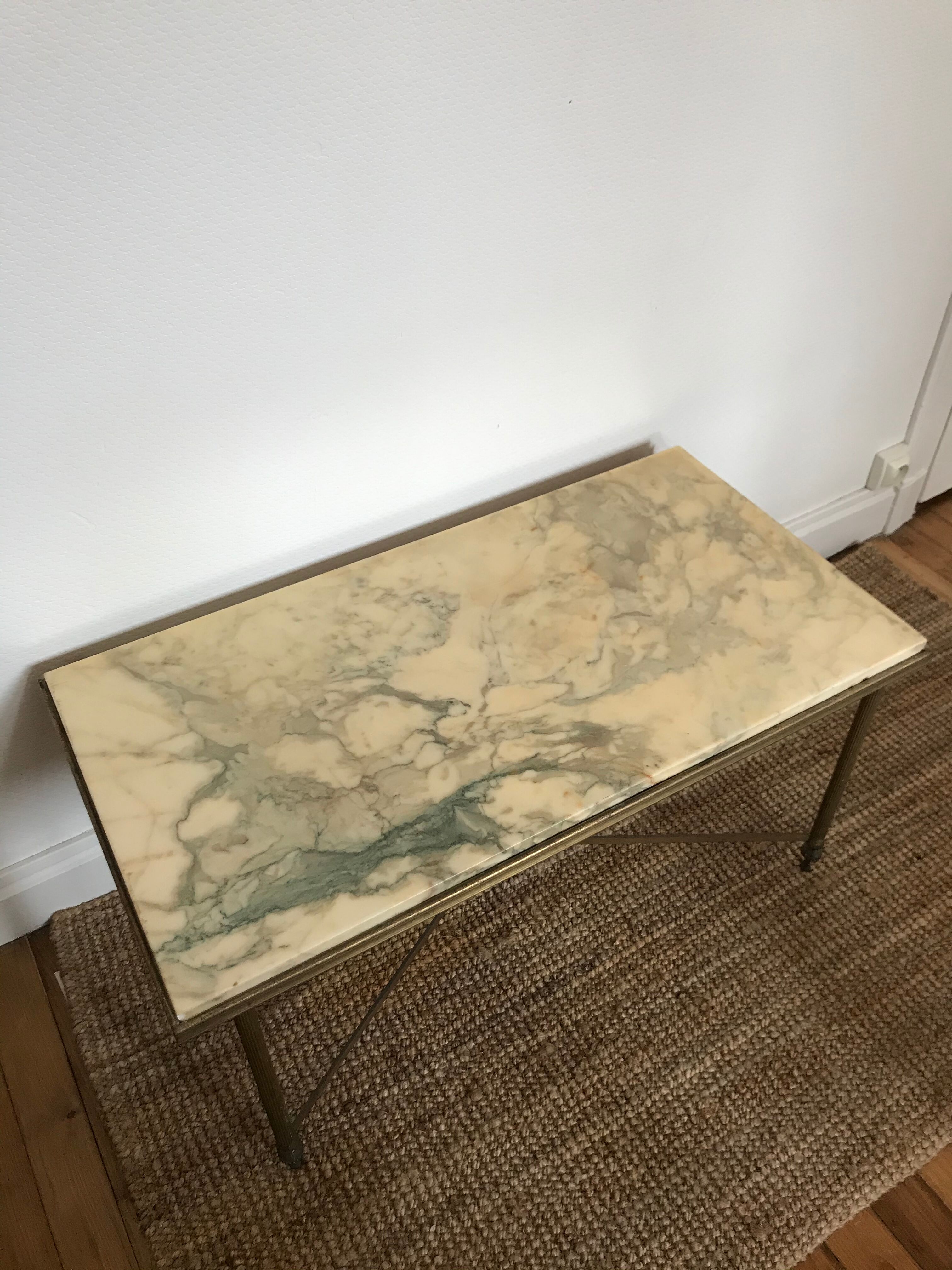 Gold metal coffee table and marble tray