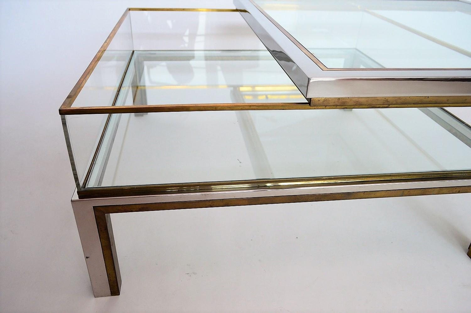 Coffee table in brass and chrome with folding top compartment to House Jansen 1970 s