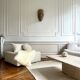 Square ottoman and its cushions in buckle fabric