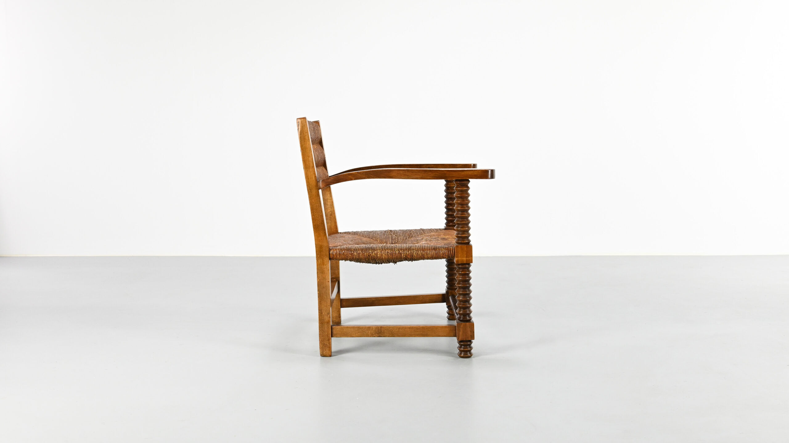 Pair of French armchairs with twisted legs in the style of Charles Dudouyt, France, 1940s.