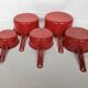 Red enamelled sheet metal pans