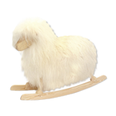 Wooden rocking horse and lambskin