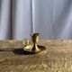 Small golden hand candlestick with a round loop handle D8 H6.5