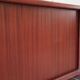 Teak enfilade, sliding doors, black faux leather top, 1970s.