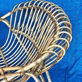 Antique rattan and wicker armchair