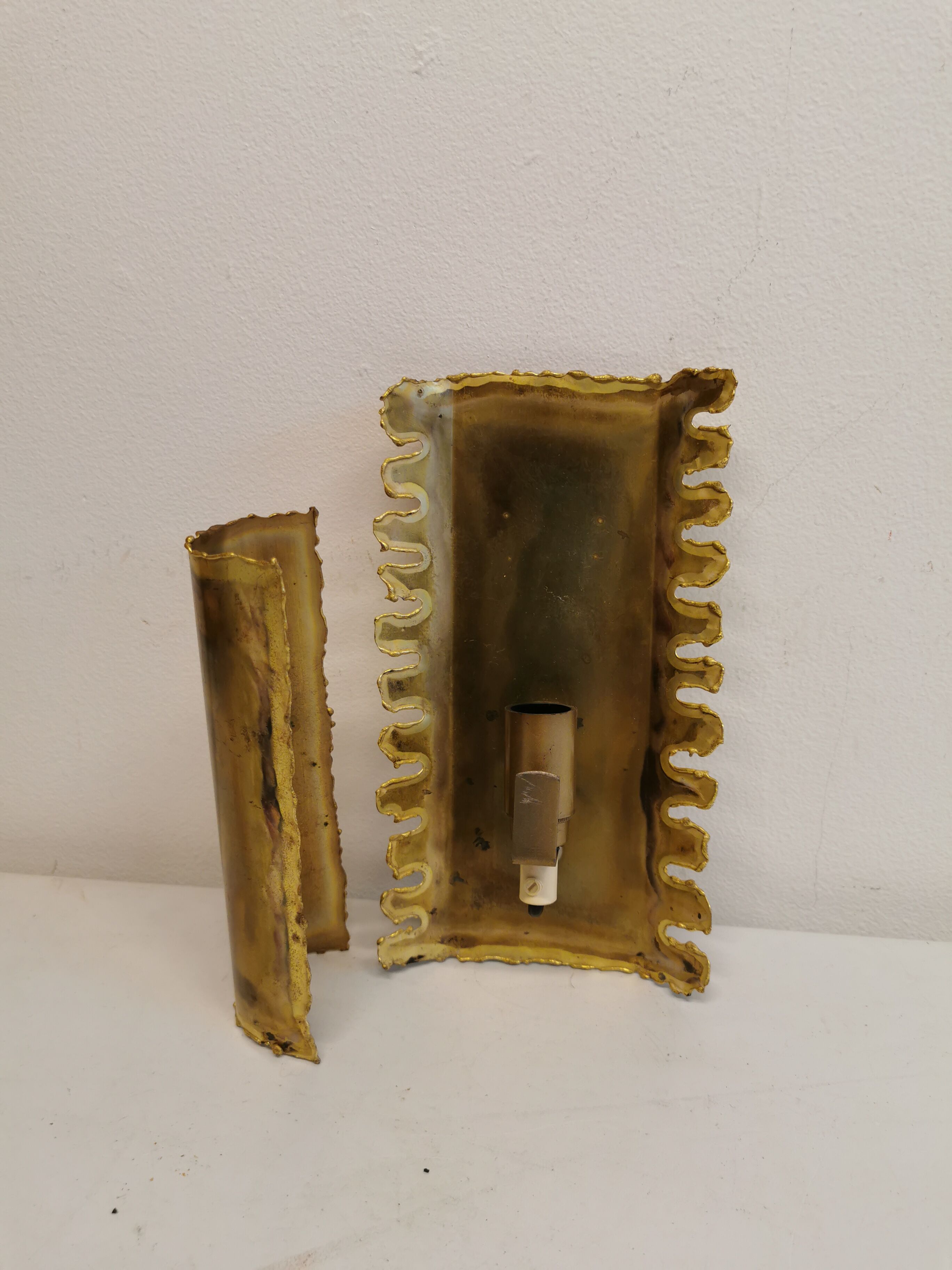 Brutalist flame cut brass wall lamp, designed by the famous Svend Aage Holm Sørensen Denmark