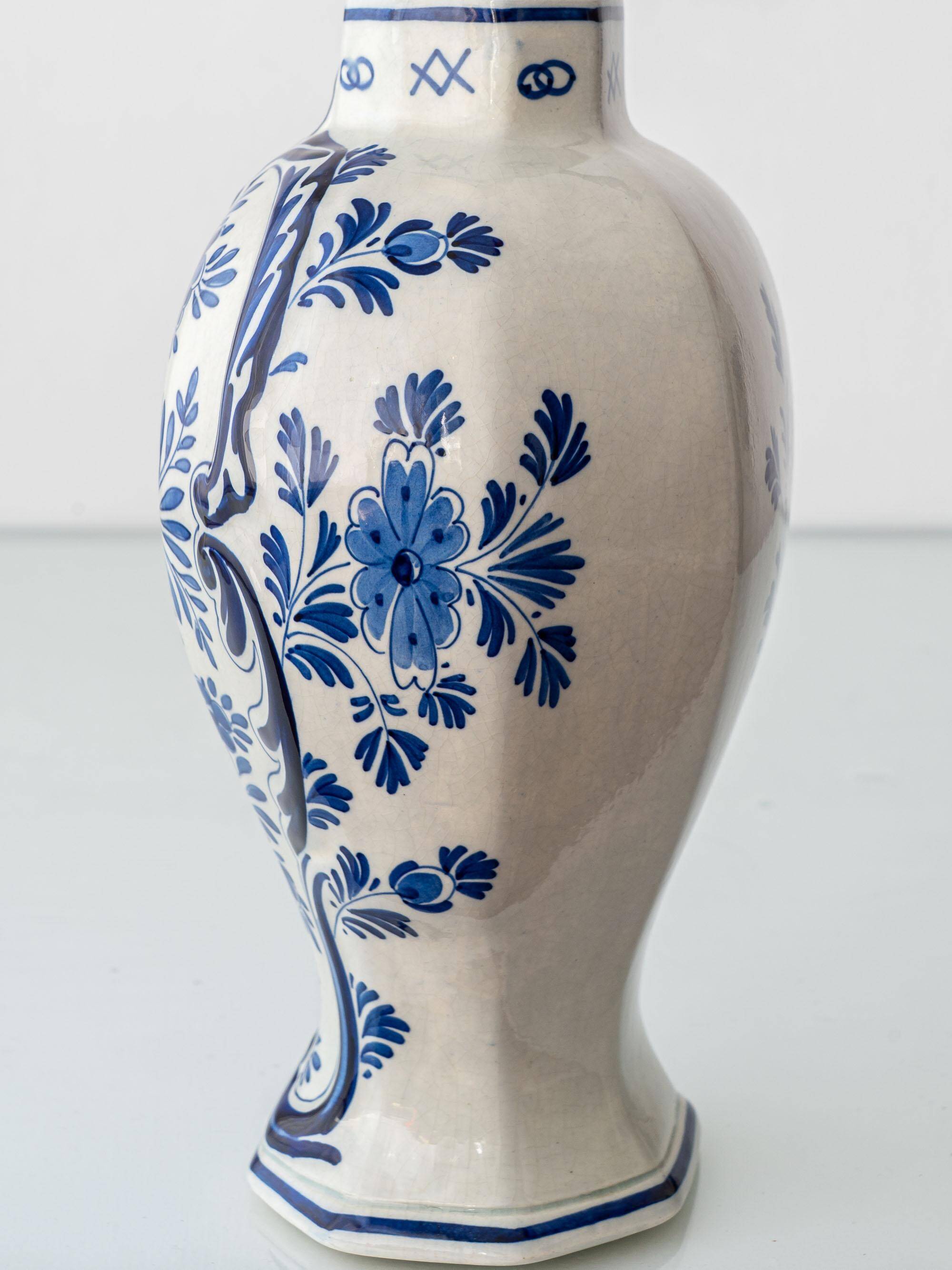 Pair of Royal Delft blue and white ceramic table lamps, 1905, with new pleated silk shades.