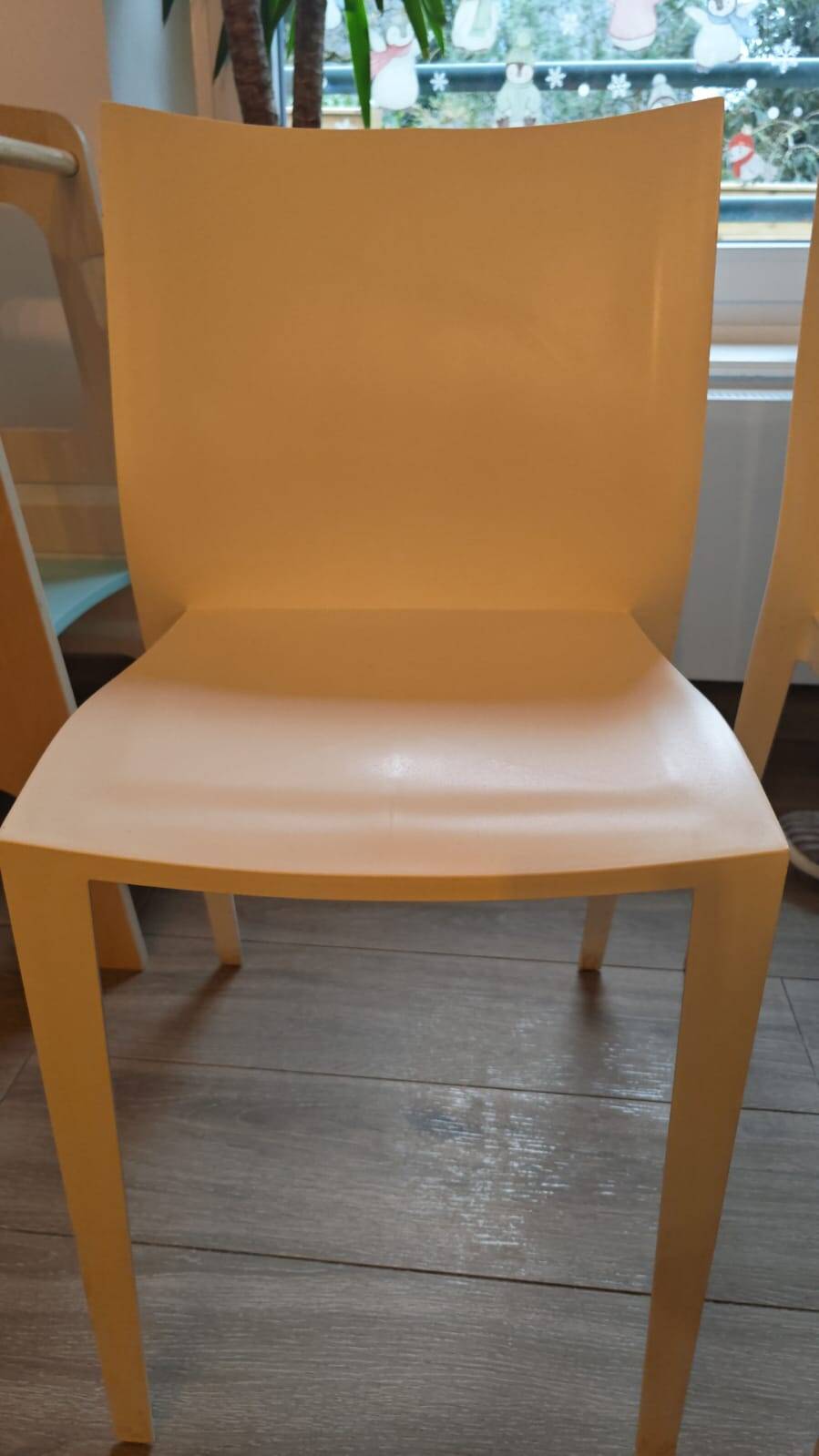 Lot of 4 Kartell "Slick" chairs designed by Philippe Starck - off-white.