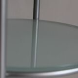 Postmodern round glass  and steel side table, 1980s.