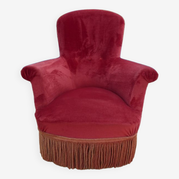 Fauteuil crapaud den velours  de couleur fusina avec assise et dossier ferme et pied bois