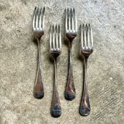 4 fourchettes en métal argenté
