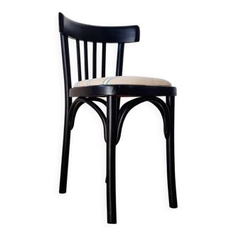 Curved black wooden bistro chair with striped seat
