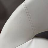 Pair of vintage white swivel armchairs in tulip style.