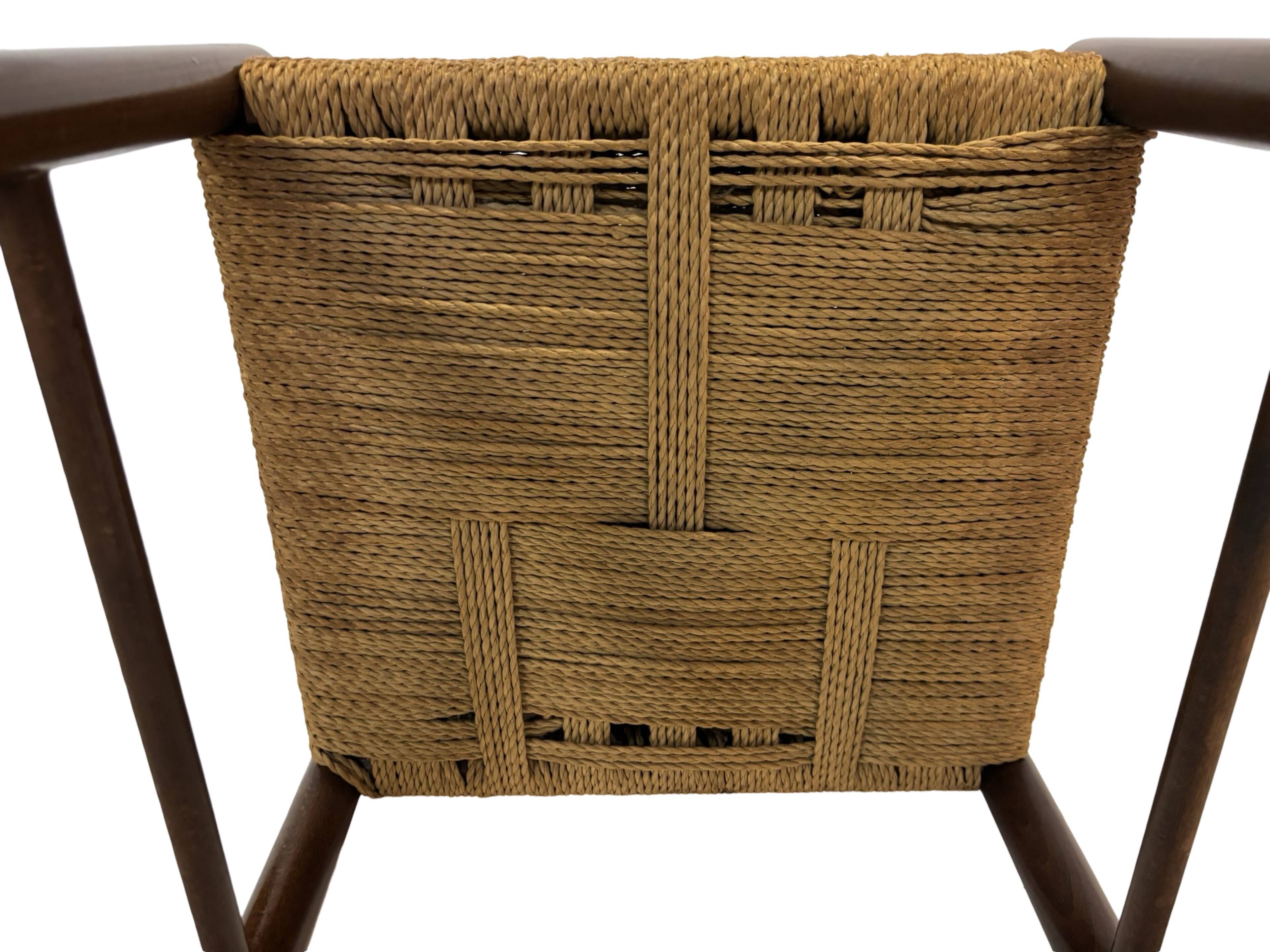 Vintage chair from the 70s minimalist design in wood and paper cord