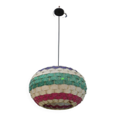 Handmade suspension in coloured woven natural plant fibres.