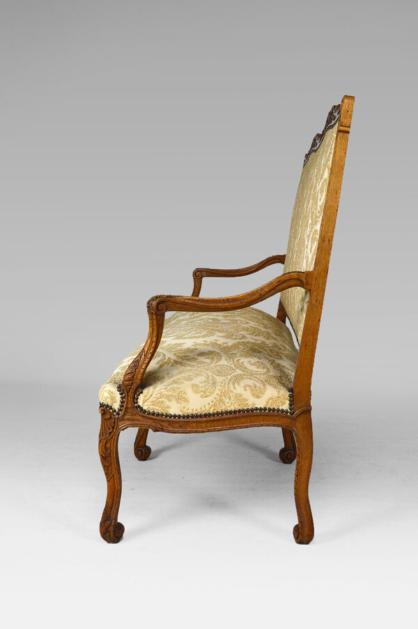 Banquette style Louis XV en chêne sculpté