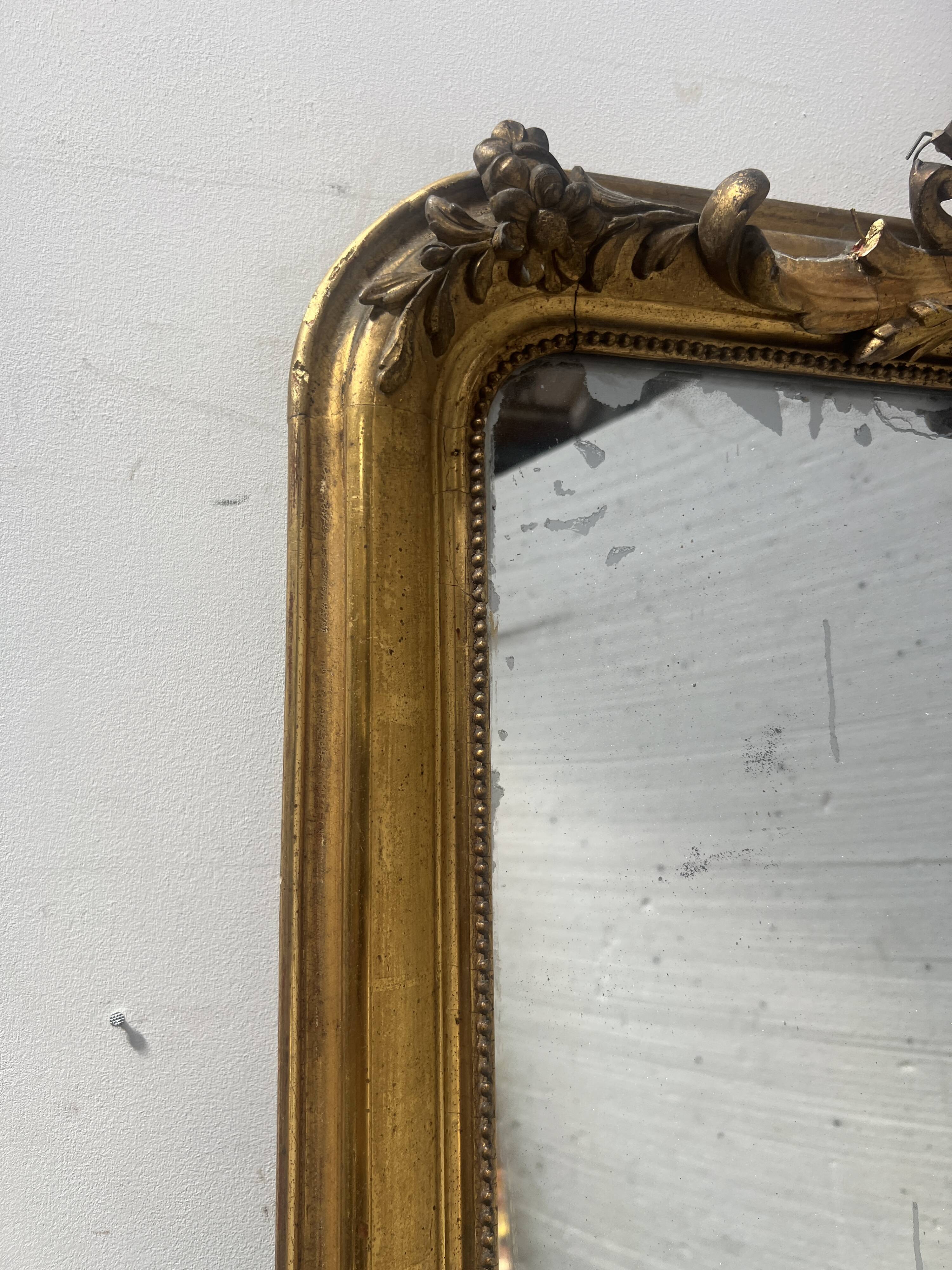 Louis XV style mirror in gilded wood and stucco