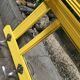 Yellow vintage coat holder