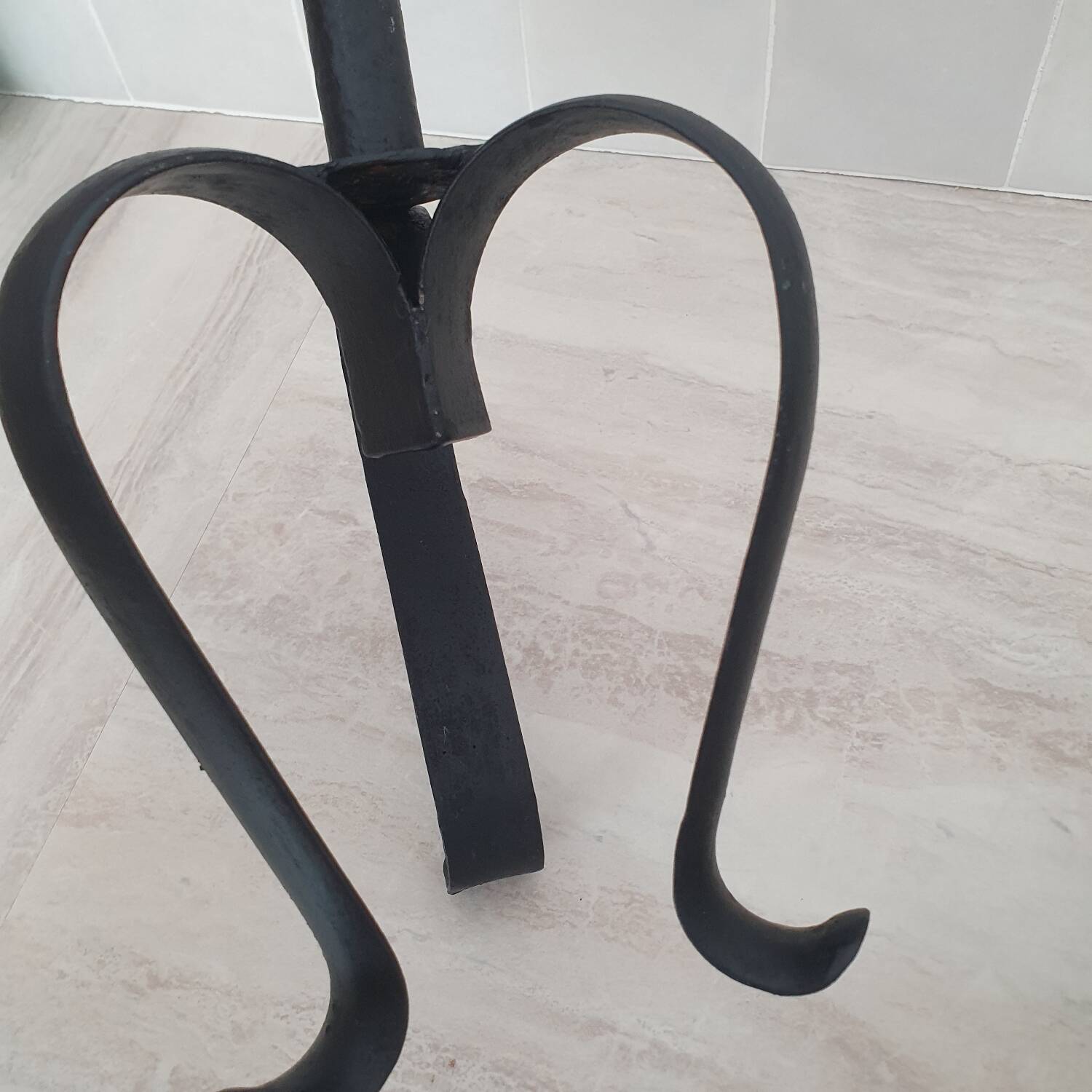 Large metal candlesticks in Brutalist style
