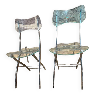 Chaises en plexiglass