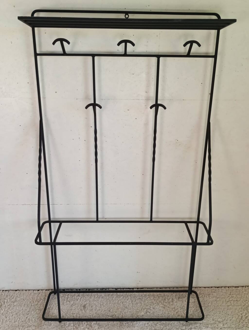 Large modernist wrought iron cloakroom from the 1950s.