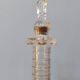 Vendôme column perfume bottle in moulded glass, 19th century.