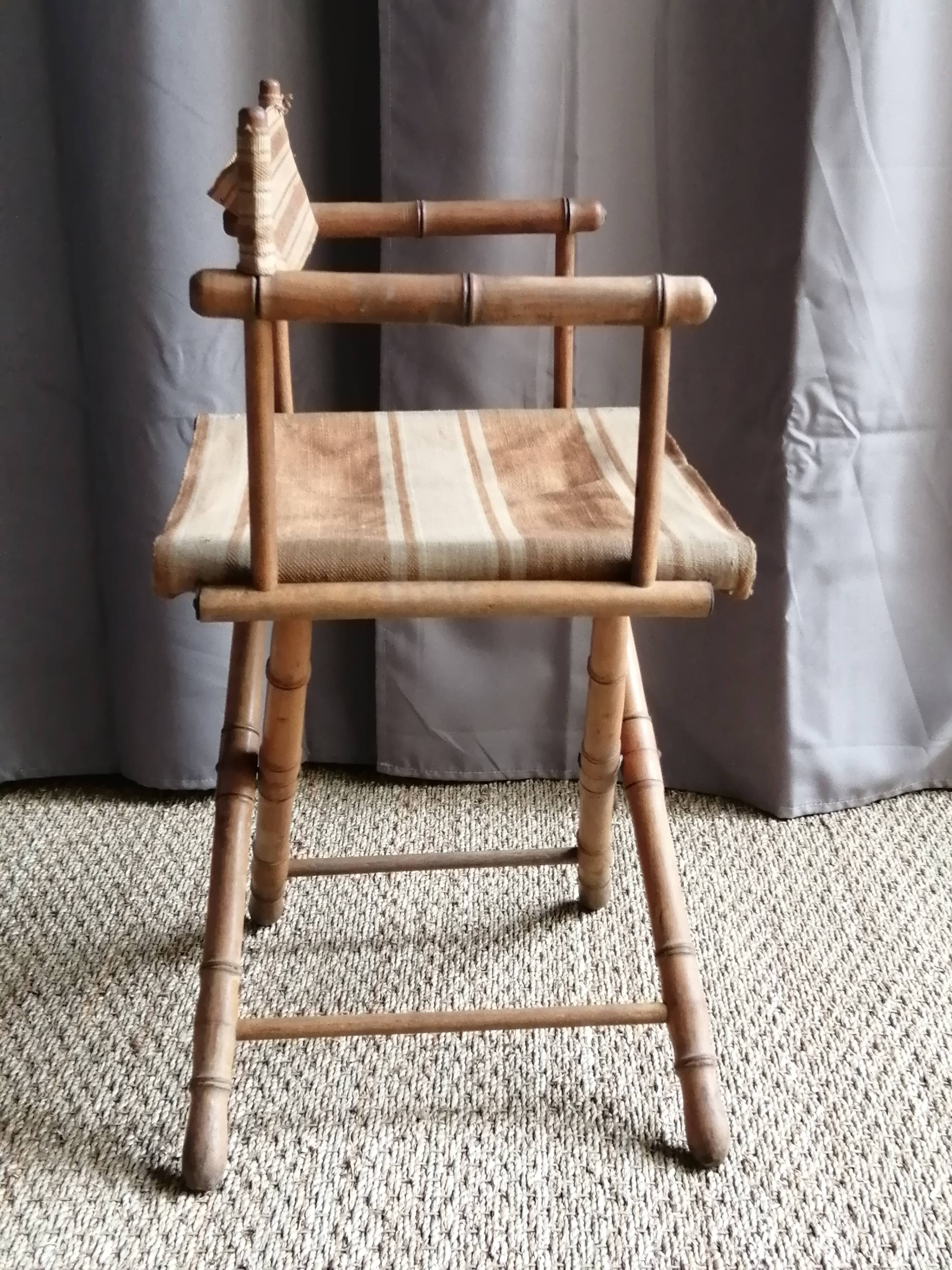 Fauteuil vintage pliant en rotin