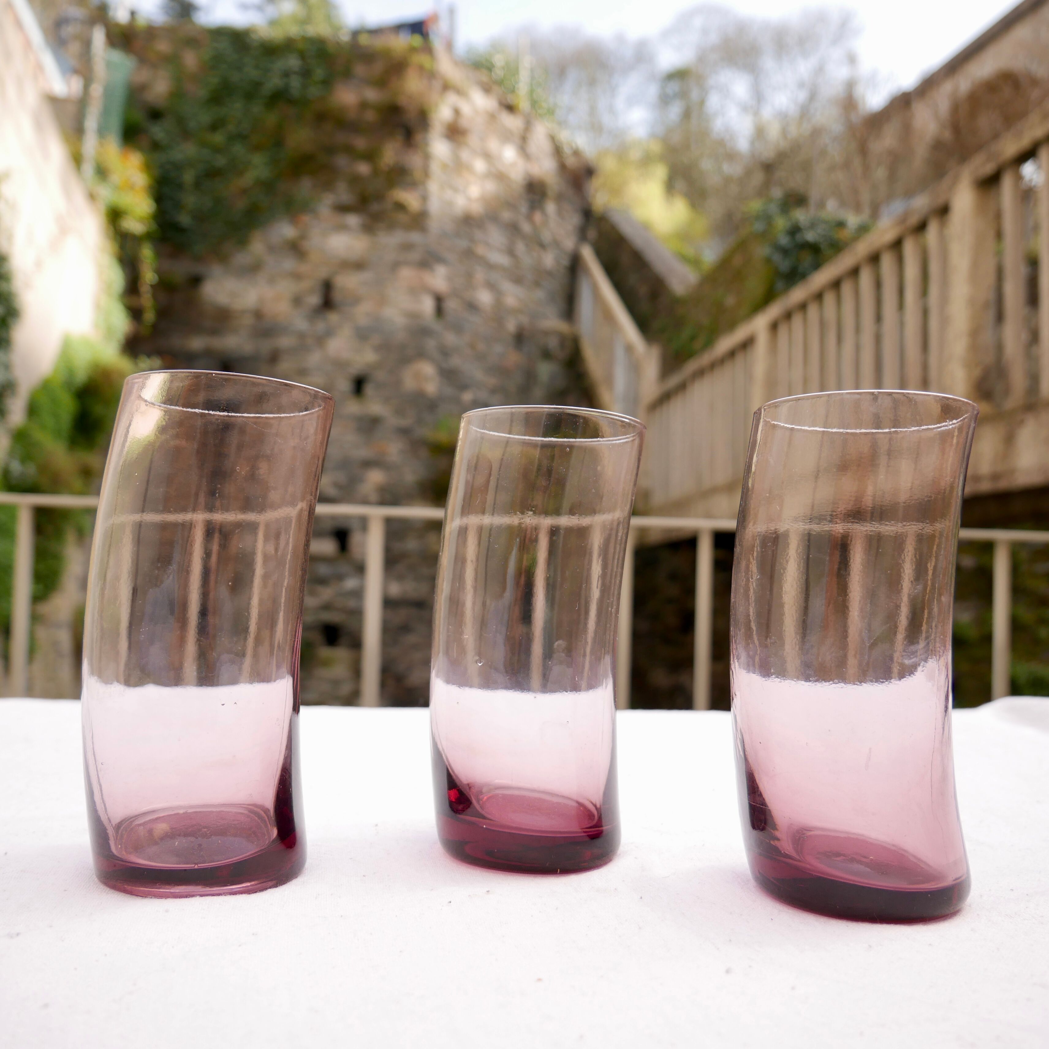 Set of 3 bent purple water glasses