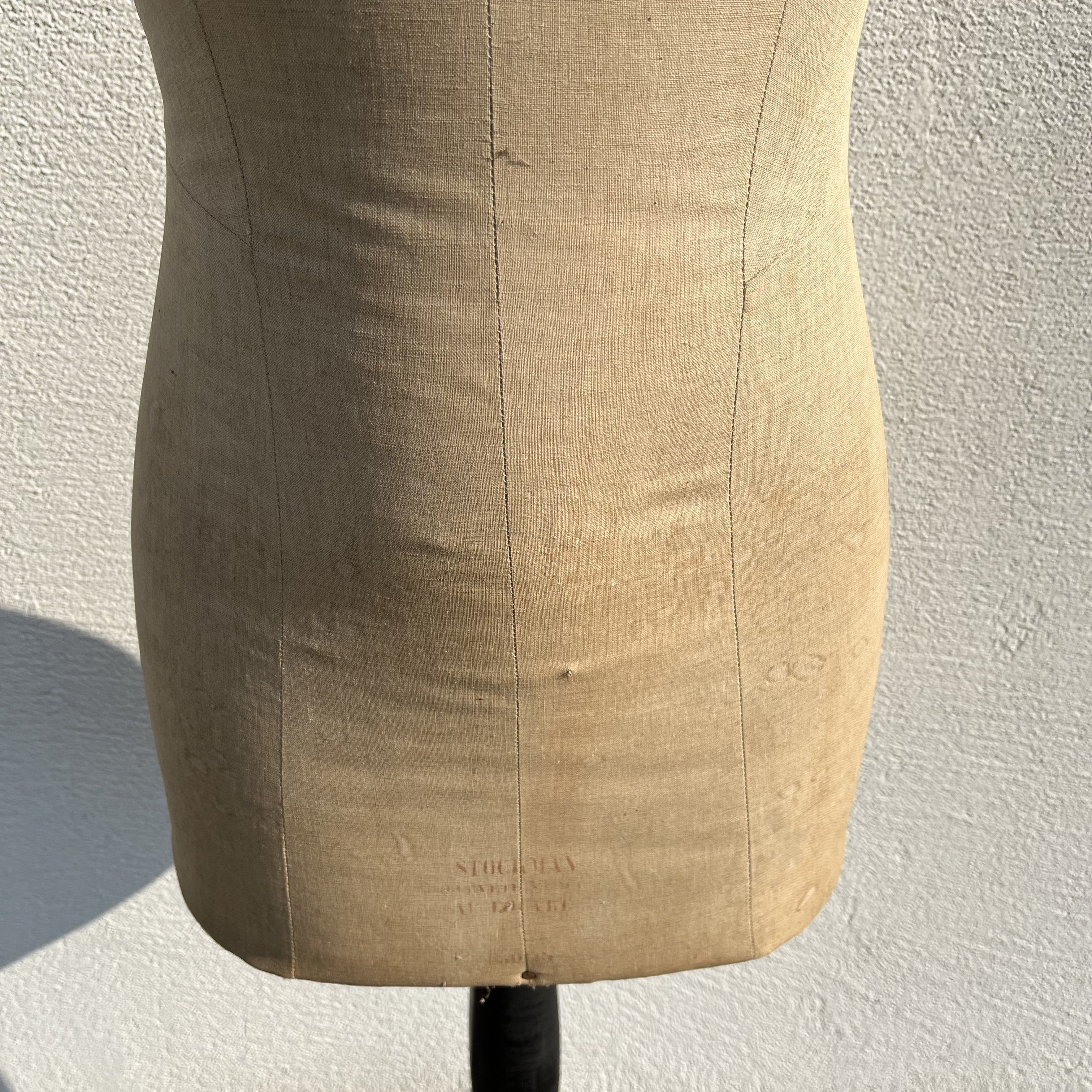 Antique mannequin in fabric and blackened wooden foot Stockman Paris Le Louvre
