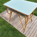Small vintage rattan desk from the 1960s.