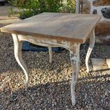 Antique square table with curved legs