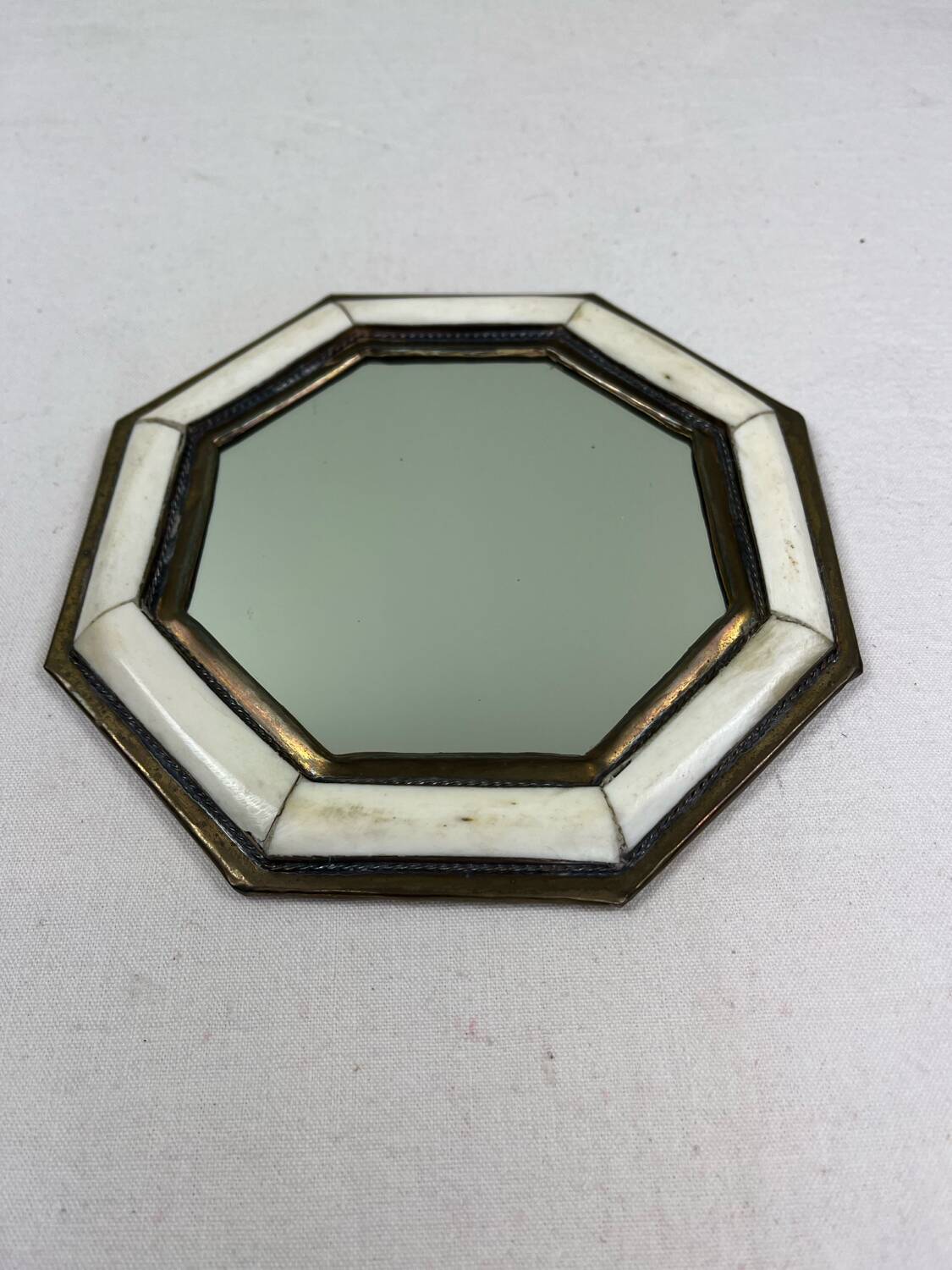 Antique brass and horn mirror