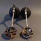 Pair of bedroom sconces in gilded brass and black aluminum 1960.