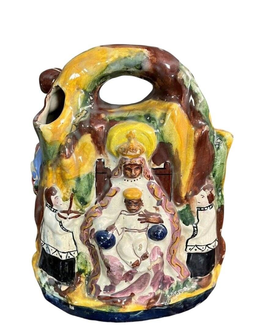 Sculpture in Spanish Majolica representing the Black Virgin with Child.