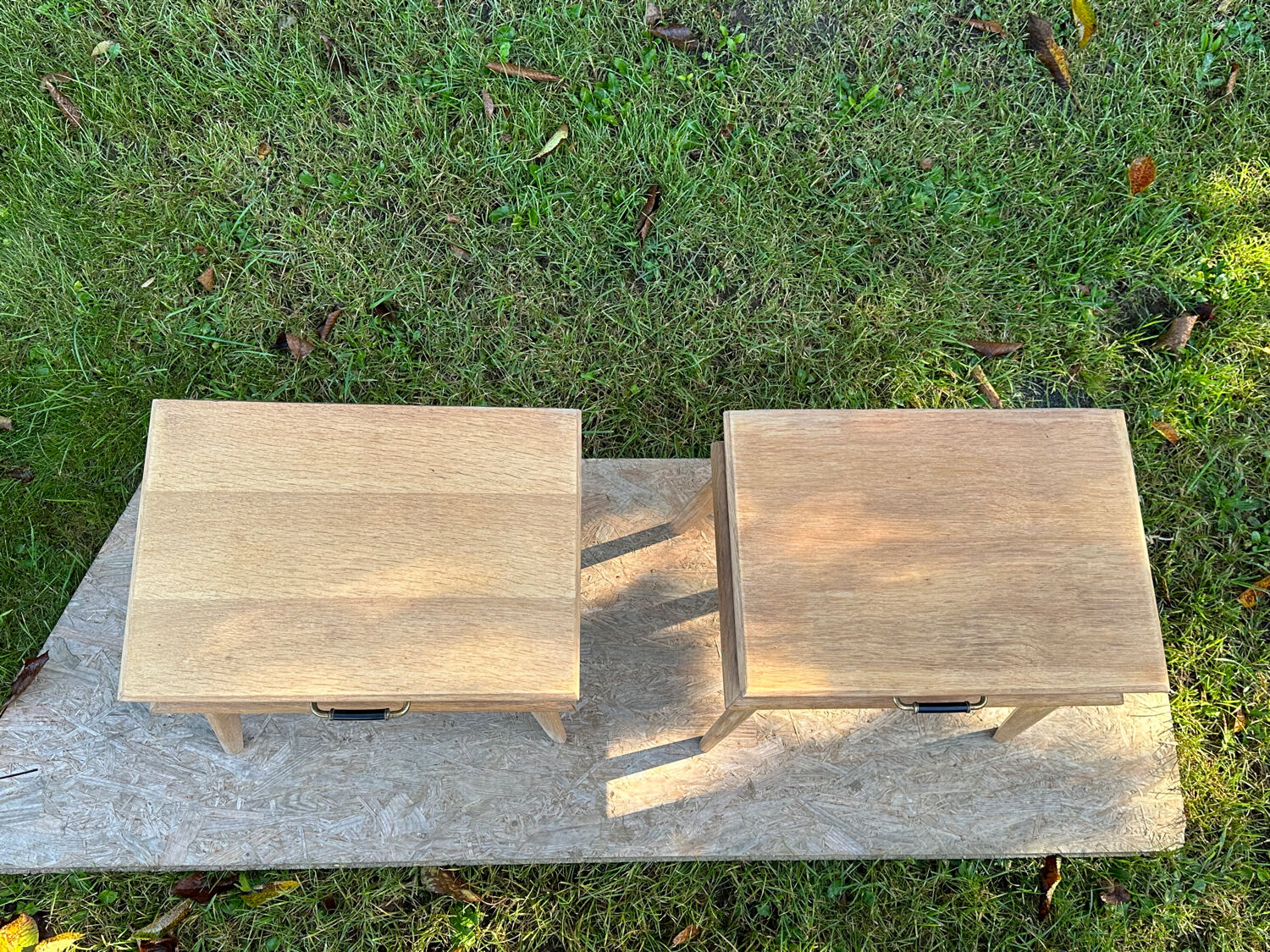 Vintage bedside tables with compass feet
