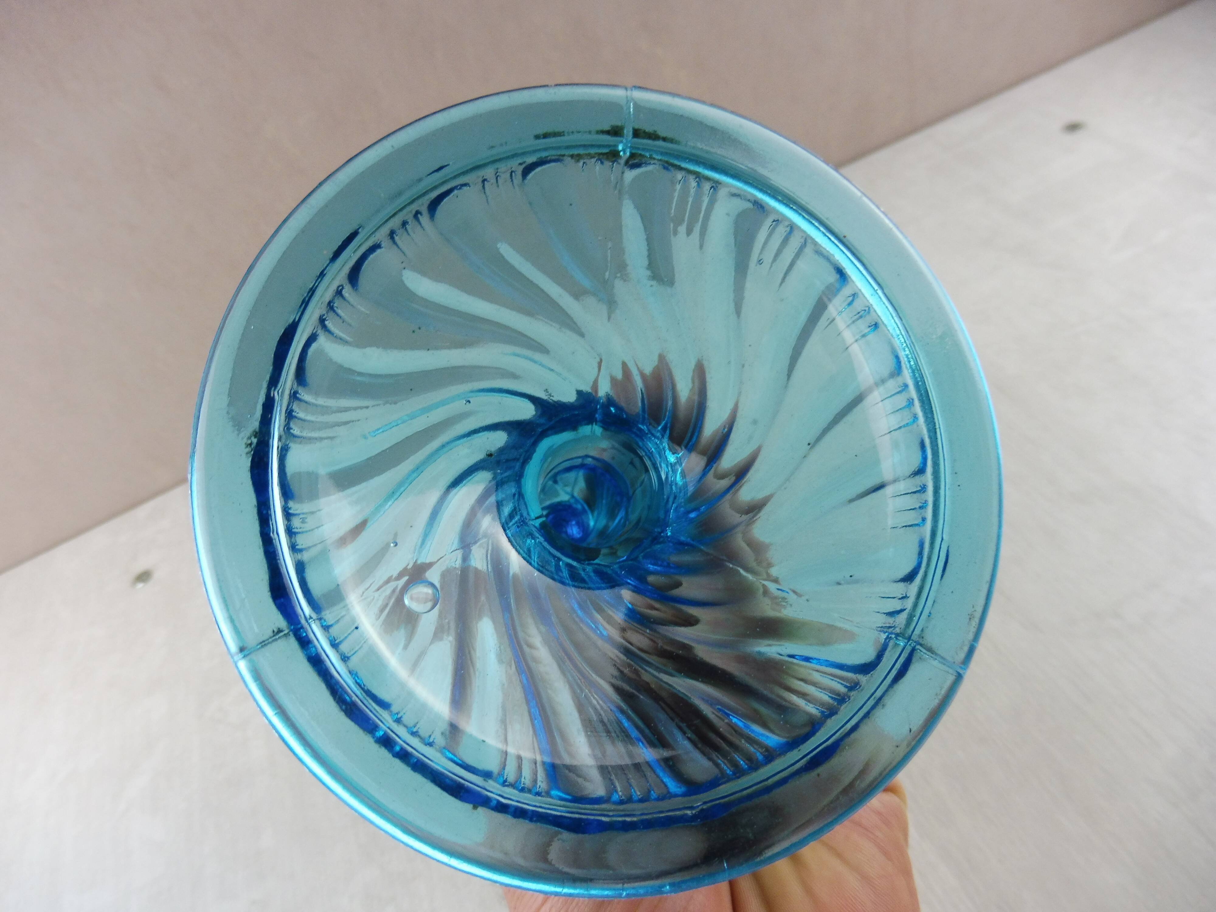 Old candlestick, blue molded glass