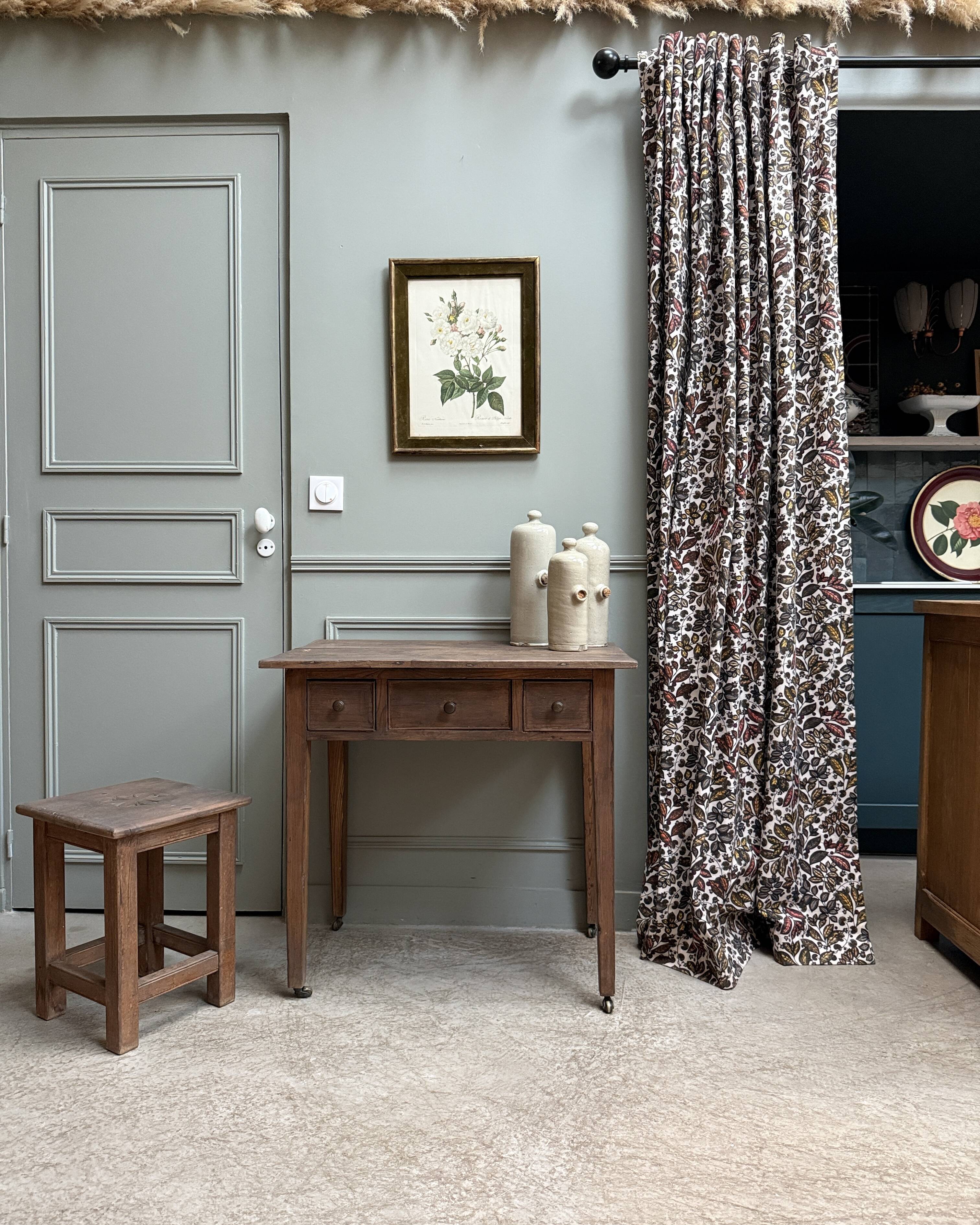 Small antique desk on wheels