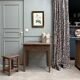 Small antique desk on wheels