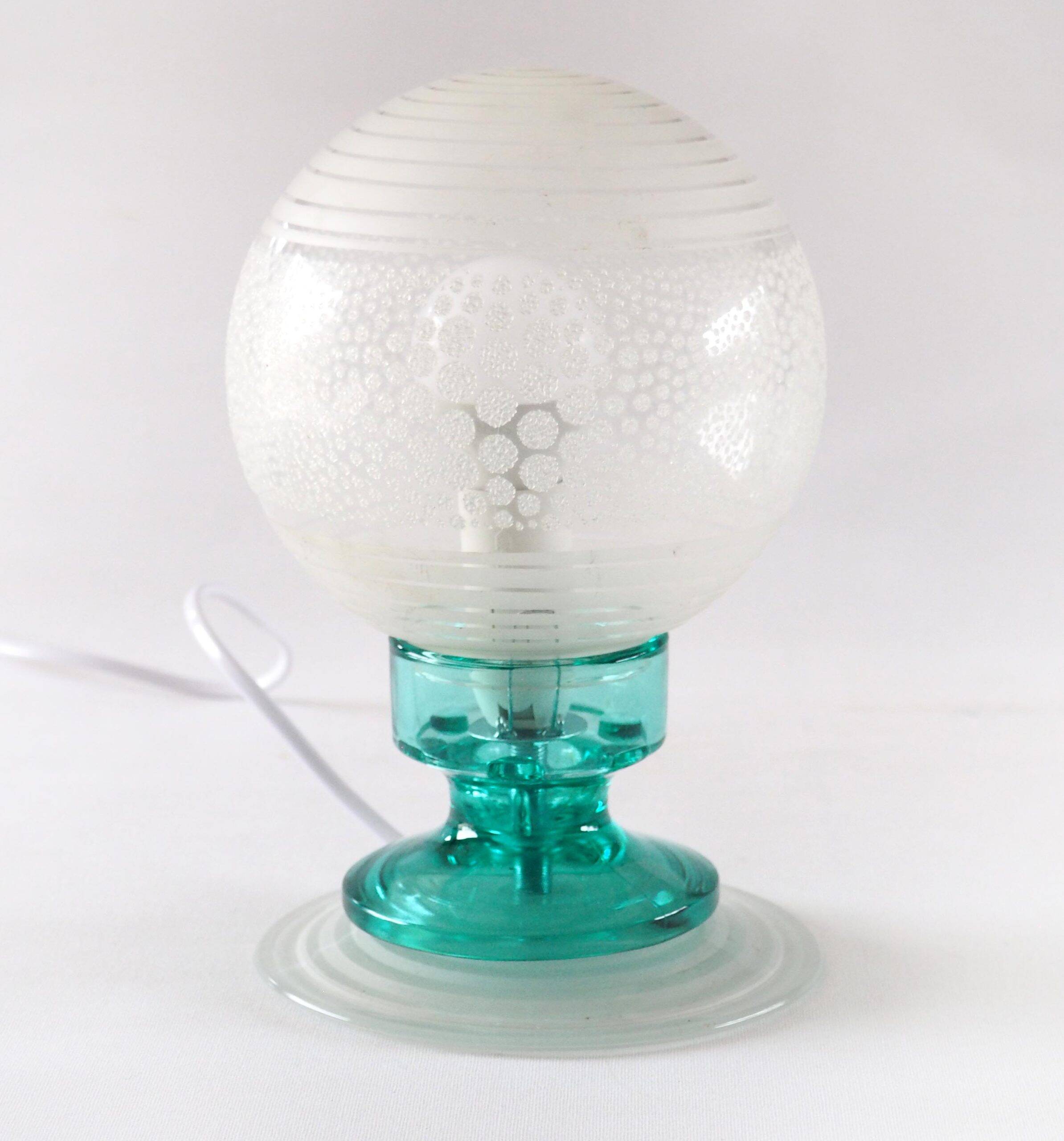 Frosted globe lamp and turquoise glass