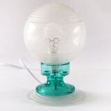 Frosted globe lamp and turquoise glass
