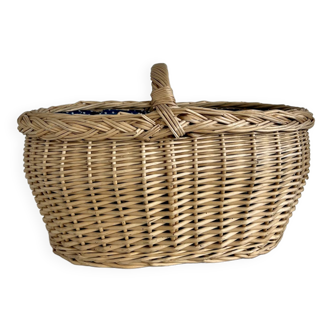 Large vintage wicker basket and blue lining with white polka dots