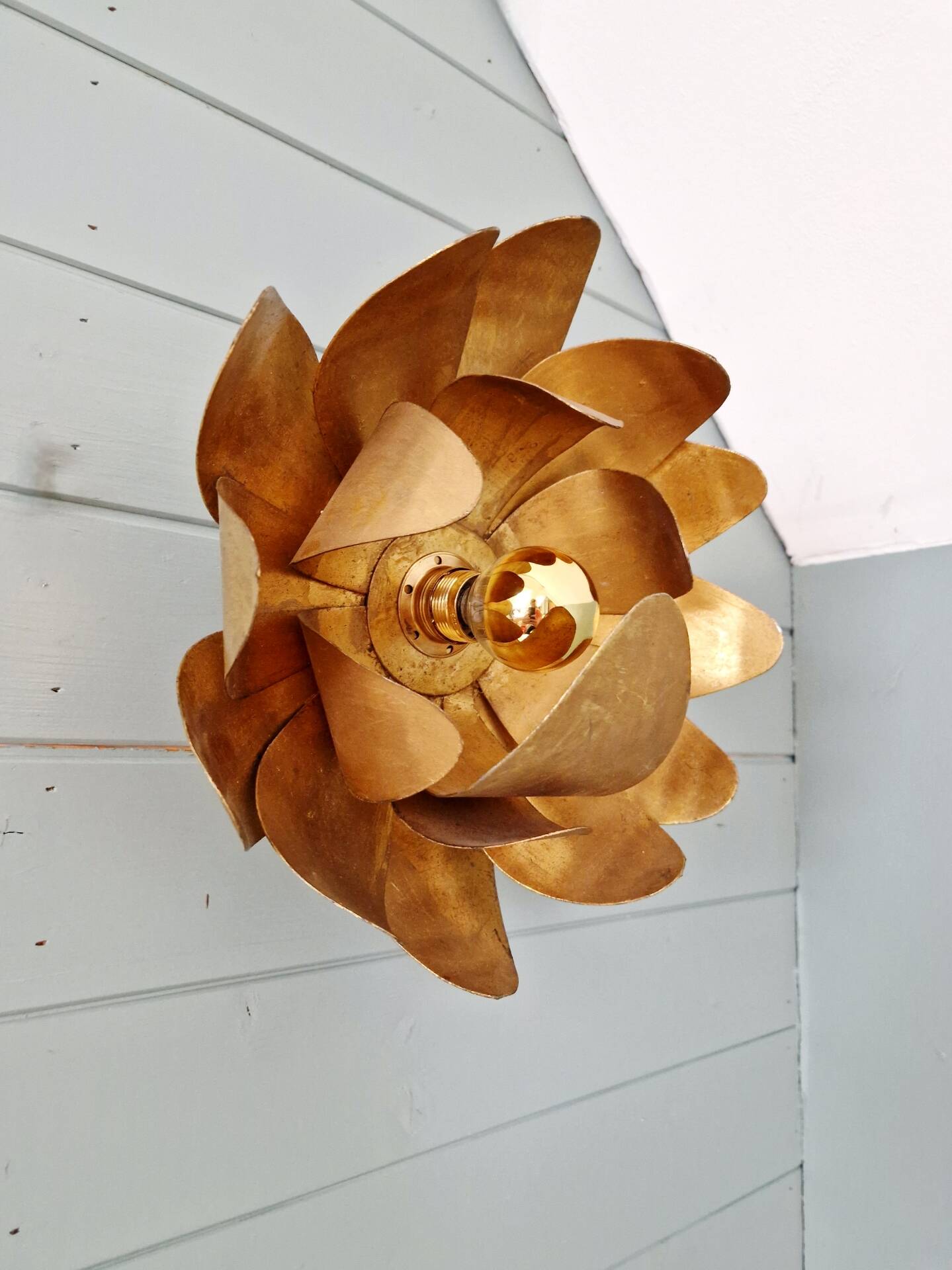 Gold metal floral wall light, 1960-70.