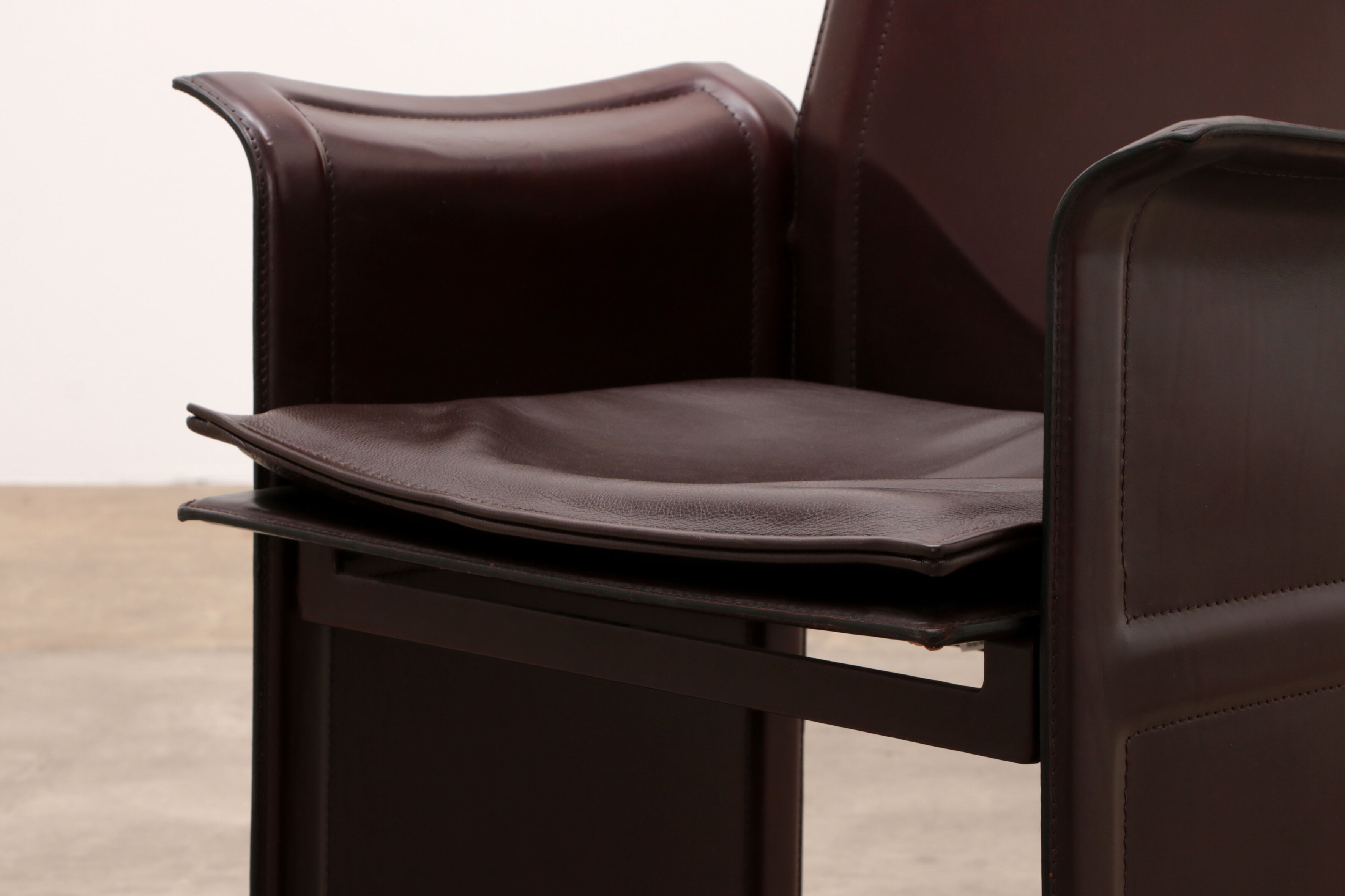 Tito Agnoli for Matteo Grassi leather dining table and six chairs