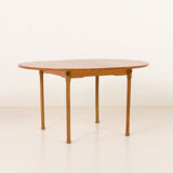 Teak round table with hidden extension, 1970s