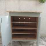 Small vintage piece of furniture with a shallow depth, re-enchanted in grey-green.