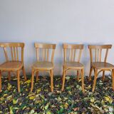 4 chaises de bistrot dont estampillée Baumann