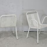 Pair of honeycomb steel armchairs. France, circa 1950.