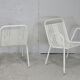 Pair of honeycomb steel armchairs. France, circa 1950.