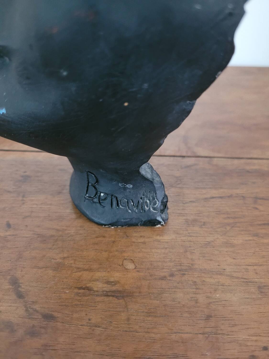 Black ceramic face sculpture